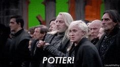 a group of people standing next to each other in front of a green screen with the words potter on it