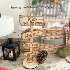 a wooden sign sitting on top of a table