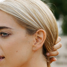 Tiny Gold Cross Studs Sometimes SIMPLE is PERFECT. Small, dainty, and finished with latch backs, these tiny hoop earrings are the gold ear huggers minimalists can't help but gush over. https://wildmoonstone.com/products/tiny-cross-earrings Gold Cross Earrings, Minimalist Earrings Gold, Tiny Cross, Studs Gold, Tiny Hoop Earrings, Simple Stud Earrings, Beauty Pop, Tiny Studs, Tiny Stud Earrings