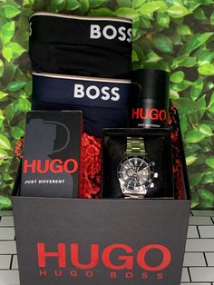 the box contains two watches, one watch and three other men's colognes