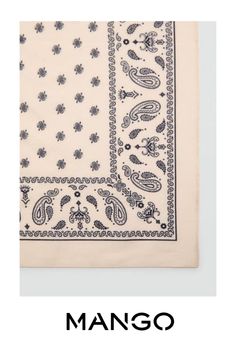 a white and blue bandanna with black paisley designs on the front, and an image of