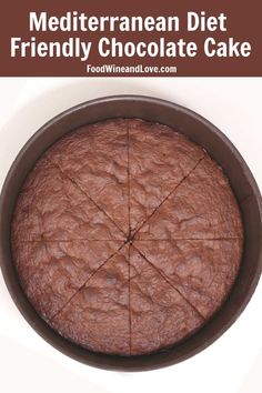 a chocolate cake in a pan with the words mediterraneanan diet friendly chocolate cake