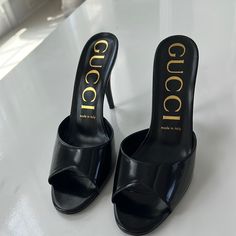 Gucci Patent Calfskin High Heel Slides 38.5 Black, Never Worn Try On Sole Mark, Gorgeous Timeless Shoe Designer Patent Leather Slip-on Heels, Luxury Slip-on Heels For Evening, Classic Gucci Heels For Parties, Designer Slip-on Heels For Evening, Chic Gucci Heels With Reinforced Heel, Gucci High Heels With Leather Sole, Gucci Black Open Toe Heels, Gucci Black Heels With 4-inch Heel, Gucci Leather Heels With 4-inch Heel