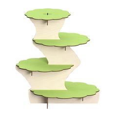 three tiered cake stand with green and white designs on each tier, one in the shape of an upside down tree