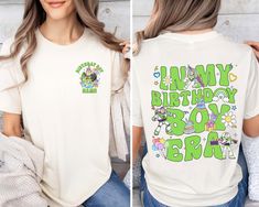 a woman wearing a white shirt with the words happy birthday boy and girl on it