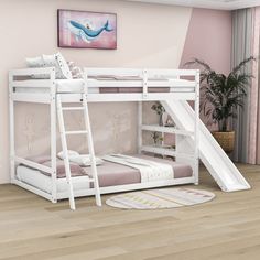 there is a bunk bed with a slide on the bottom and stairs to the top