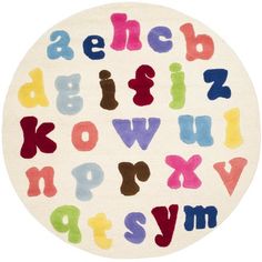 a round rug with letters and numbers on the front in multi - colored colors,