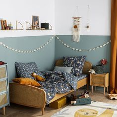 a bed room with a neatly made bed