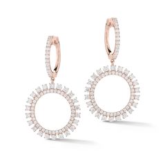 Life's a little brighter with bursts of diamonds. These earrings drop from a latch back which is adorned with round brilliant-cut, prong-set diamonds. This seriously stunning pair is sure to achieve a cheerful, polished look. -18K gold weighing 6.13 grams -142 round prong-set brilliant-cut diamonds totaling 1.85 carats. Available in yellow, white, and rose gold. Please allow 4-6 weeks for delivery if item is not in stock. Item no. E10961