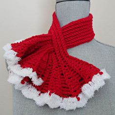 A Christmas holiday delight this cozy and stylish hand crochet keyhole scarf is made up in a soft acrylic red yarn. One side features a hole through which you can pass the other side for a secure fit.  This scarf has a nice drape and gives a layer of warmth around your back and front neck and décolletage area. The ruffled ends are accented with a fluffy white fur making them perfect for Ms. Santa Claus.   As with all my hand knit and crochet items, I suggest hand washing and lay flat to dry to retain the original shape and texture of the crochet. Crochet Keyhole Scarf, Keyhole Scarf, Crocheted Scarf, Red And White Christmas, Style Scarf, Scarf Neck, Red Yarn, Ruffles Fashion, Crochet Items