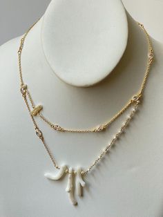 Vintage white coral (from Italian shores) and freshwater pearls make up this unique asymmetrical necklace. Unique White Pearl Chain Necklaces, Unique White Pearl Chain Necklace, Luxury White Double Strand Necklace, Unique White Pearl Necklaces, Unique White Pearl Necklace, Asymmetrical Necklace, Jewelry Pearls, White Coral, Pearl Shell