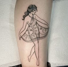 a woman in a ballerina dress is on the leg with her arm tattoo design