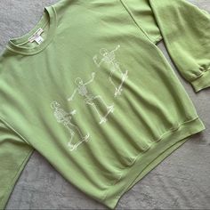 Great Used Condition. Skateboard Skeletons Sweatshirt By Urban Outfitters X Project Social T In Light Green With White Detailing. Spooky Street Style, Perfect For Halloween Or Anytime. Oversized, Baggy Sweatshirt With Crew Neck And Pullover Silhouette. Soft, Washed-Down Cotton With Skateboarding Skeletons Graphics At Front And Back, See Video. Ultra-Relaxed Cut With Dropped Long Sleeves And Ribbed Trims. Note: Light Wear With A Few Faint Discolorations Throughout, See Photos. Size L/Xl, Listed As Xl, See Photos For Measurements. Baggy Sweatshirt, Urban Outfitters Tops, Oversized Sweatshirt, Skateboarding, Light Green, Skeleton, Skateboard, Urban Outfitters, Street Style