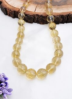 Natural Honey Quartz Faceted Balls Gemstone Necklace Weight: 525 Carats Size: 6 To 12 MM Strands: 1 Length: 18 Inches Shape: Balls S H I P P I N G & R E T U R N P O L I C Y We offer FREE SHIPPING Worldwide. For Express Delivery Upgrade, Choose the Option on the checkout page. Return Policy: We accept RETURN & EXCHANGE Formal Yellow Faceted Necklace, Amber Round Wedding Necklaces, Faceted Amber Round Necklace, Faceted Amber Necklace, Faceted Crystal Necklaces For Formal Occasions, Formal Round Faceted Crystal Necklaces, Formal Faceted Round Crystal Necklace, Round Faceted Beads Necklace For Formal Occasions, Formal Faceted Beads Round Necklace