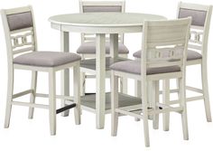 a white table with four chairs and a round dining table in front of it on a white background