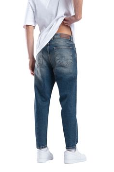 Tapered Jeans, available in a range of colors to suit your style. With an ankle-sized cut, these jeans strike the perfect balance between loose and fitted. The Tapered Fit offers a medium rise, providing ample room in the seat and thigh, while gradually tapering from knee to hem. Crafted from high-quality denim, these jeans are both stylish and cool. Elevate your wardrobe with this fashionable piece that combines comfort and trendiness effortlessly.  Machine wash max. 30ºC/86ºF /Medium Spin/ Do not use bleach/ Iron low tempature/ Do not tumble dry Fabric: Denim  Fit: Loose fit for maximum comfort Care Instructions: Machine wash at a maximum of 30°C (86°F) on a medium spin. Do not bleach. Iron at a low temperature. Do not tumble dry. Stocking Fillers For Him, Stocking Fillers For Her, Forever Jewelry, Tapered Jeans, Love Is Free, Tie Shoes, Cuff Earrings, Beauty Bag, Independent Designers Fashion