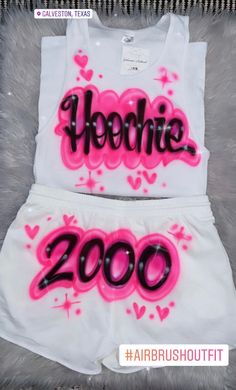 Designs by Galveston Airbrush! ♡ Feel free to contact me with any questions or custom orders. ✧ Our Designs on these cute White beater Tank tops and Booty Shorts are handmade with the artists' skilled Hands and that makes each item unique ✧ Each design includes up to TWO names or words with up to THREE specified COLORS. SIZES: Available for ADULTS DESIGN PLACEMENT: All designs are airbrushed on the FRONT of our White Beater Tank top and BACK of the Booty Shorts unless specified otherwise. Intern Air Brush Shorts, 90s Airbrush Outfits, Airbrush Outfits, Freaknik 90s Outfit, Pink Bucket Hat, Airbrush T Shirts, Short Blanc, Cute Birthday Outfits, White Booties