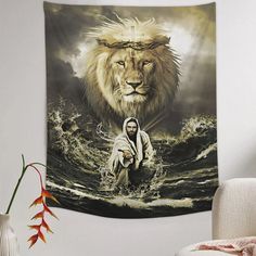 a wall hanging with a lion and jesus in the water on it's side