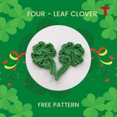 two green crocheted clovers on a white plate with the text four leaf clover