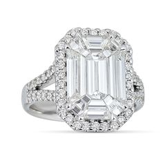 Formal Octagon Baguette Diamond Ring, White Emerald Cut Dazzling Diamond Ring, Dazzling White Emerald Cut Diamond Ring, Dazzling White Emerald-cut Diamond Ring, White Gold Emerald Ring With Baguette Diamonds, Luxury White Emerald Cut Diamond Ring, Gia Certified White Baguette Cut Emerald Ring, White Emerald Cut Platinum Diamond Ring, White Emerald Cut Platinum Emerald Ring