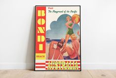 an old poster advertises women playing with a ball on the beach, in front of a white wall