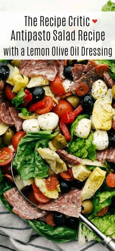 a salad with olives, tomatoes and mozzarella cheese on it in a bowl