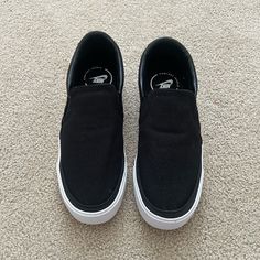 Women’s Nike Slip On Shoes. Size 6, Comfort Insole. Never Worn. Black Synthetic Slip-on Sneakers With Vulcanized Sole, Textured Sole Round Toe Slip-ons For Streetwear, Black Slip-on Sneakers With Rubber Sole, Textured Sole Slip-ons With Round Toe For Streetwear, Round Toe Slip-ons With Textured Sole For Streetwear, Black Closed Toe Slip-on Sneakers With Rubber Sole, Black Closed Toe Slip-on Sneakers, Black Closed Toe Casual Slip-on Sneakers, Black Casual Closed Toe Slip-on Sneakers