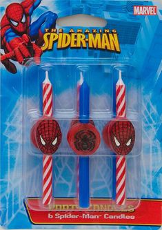 two spider - man candles are in the packaging for action figure play set, which is designed to look like candy canes