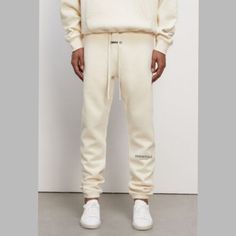 Cream White Straight Hem Bottoms For Fall, White Bottoms With Straight Hem For Fall, White Pants For Streetwear In Fall, White Straight-leg Joggers For Spring, White Straight Leg Joggers For Spring, White Straight Leg Spring Joggers, White Athleisure Pants With Straight Hem, White Sweatpants Straight Hem For Spring, White Sweatpants With Straight Hem For Spring