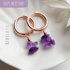 💜 Adorn yourself with the timeless elegance of our Amethyst Hoop Earrings, designed to celebrate the February birthstone in a natural and handmade crystal jewelry piece. These earrings are a perfect choice for those who appreciate the charm of this exquisite gem and add a touch of sophistication to your collection of crystal jewelry 💜 ⭒ Material: Stainless Steel  ⭒ Finish: Silver * Gold * Rose Gold ⭒ Hoop Size:  thickness: 2.5mm / internal diameter: 10mm or 14mm ⭒ Gemstone size: x3 chips 5-8mm Hoop Earrings With Natural Stones For Gift, Amethyst Hoop Earrings Gift, Amethyst Dangle Hoop Earrings Gift, Gift Amethyst Hoop Earrings With Ear Wire, Amethyst Hoop Earrings With Ear Wire, Gift, Amethyst Gemstone Hoop Earrings As Gift, Amethyst Hoop Earrings With Gemstone For Gifts, Raw Crystal Earrings, Handmade Crystal Jewelry