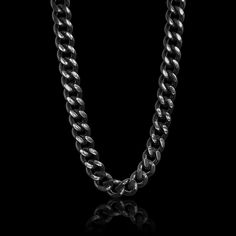 Introducing the Stainless Steel Black Curb Chain Necklace! This 13mm thick necklace features a dark black finish along a stainless steel curb chain for a unique heavy duty look. Its perfect for adding a touch of edge to any outfit and with the simple flat curb design this chain will rest smoothly against your chest for comfortable everyday wear. Great for creating your own statement piece by adding your favorite pendant or layering with other various chains for a distinctive look. So whether you Thick Necklace, Figaro Chain Necklace, Biker Jewelry, Curb Chain Necklace, Gift Sets For Women, Skull Bracelet, Bracelet Collection, Black Stainless Steel, Stainless Steel Necklace