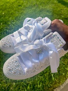 Blinged Chic Sneakers Add Some Sparkle To Your Wedding Day, Anniversary, Birthday Party, Sweet 16, Social Event Or Prom With These Authentic Custom Bling Low Top All Star Converse Encrusted With High Quality Crystals And White AB Pearls. Each Pair Of Sneakers Comes With:* Carrying Sneaker Bag (Original Box NOT Included )* White Satin Laces ( Original laces included ) * Small Repair Kit Interested In A Different Color? No Worries. Simply Contact Us With The Color Of Your Choice And We'll Be More Blinged Out Sneakers, Converse Bedazzled, Bedazzle Shoes, Bedazzled Sneakers, Sneaker Ball Outfit Ideas, Diamond Sneakers, Custom Tennis Shoes, Customized Converse, Bedazzled Converse