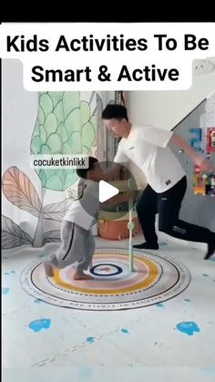 two kids are playing with an interactive toy