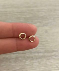 Open Circle Studs * 1 pair * 14k Gold * Size: 7 mm * Made in U.S.A. 14k Gold-filled Yellow Gold Cartilage Earrings, Gold Plated Minimalist Round Cartilage Earrings, Gold 14k Gold Filled Cartilage Earrings, 14k Gold Filled Gold Cartilage Earrings, Minimalist Gold-plated Cartilage Earrings, Delicate Hypoallergenic 14k Gold Cartilage Earrings, Rose Gold Round Cartilage Earrings For Everyday, Gold Round Everyday Cartilage Earrings, Nickel Free 14k Gold Cartilage Earrings