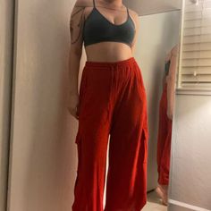 Vintage Jean Paul Gaultier Low Rise Wide Leg Micro Mesh Cargo Pant In Scarlett. Relaxed Fit, Drawstring Cinch Waist, Low Rise, Cargo Design, Micro Mesh Construction, Stretchy. A Couple Tiny Inconspicuous Discolored Speckles On Leg, Otherwise Excellent Vintage Condition. No Size Tag - Fits Like S/M/4/6 But Please Refer To Measurements To Ensure Fit. Measurements Taken Flat Across: Waist 14.5” Hips 20” Front Rise 13” Inseam 26” Leg Opening 14” Fitted Red Casual Cargo Pants, Red Cargos, Red Straight Leg Cargo Pants, Red Straight Leg Cargo Pants With Pockets, Red Cotton Cargo Pants, Jean Paul Gaultier Jeans Pants, Cargo Design, Vintage Jean Paul Gaultier, M 4