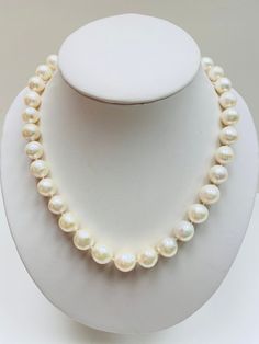 "This natural pearl is perfect for any elegant look! It is made with natural freshwater pearls that will look stunning on all of your outfits. The natural pearls mixed front larger pearl and back smaller pearl with the beautiful clasp style will give you an effortless yet elegant look! Wear it to formal events such as parties and weddings. It is also a good gift for family members and friends. Pearl Size: 10 mm  Necklace Length: 19\" If you are looking for something longer, then check out this stunning piece: https://www.etsy.com/listing/910357993/" Pearl Necklace Classic, Pearl Necklace Bridal, Classic Pearl Necklace, Natural Pearl Necklace, Necklace Bridal, Freshwater Pearl Necklace, Handmade Jewelry Diy, Natural Pearl, Freshwater Pearl Necklaces