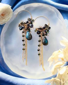 Welcome to visit my Jewelry store:  https://www.etsy.com/shop/Jeansdreamjewelry  Custom order accepted now. Feel free to ask me to see if it is possible. I would love to meet your requirements.  Made to order. Every item will come in a jewelry pouch for safety during travel and gift giving. These dangle earrings are handmade with all natural high quality and well selected gemstones. They are lightweight and comfortable to wear. All materials used are nickel free, friendly to sensitive skin.  🌷MEASUREMENTS Length: 7.8 cm including ear-wire Width: 1.5 cm 🌷GEMSTONE  🔹Labradorite  🔹Tourmaline  🔹Black Zircon 🔹Pearl 🔹Lead Glass 🌷MATERIALS 🔹14K gold filled ear wire, 14K gold filled wrapping wire, 14K gold filled chain 🌷How to take care of my jewelry All handmade jewelry are made with de Garnet Jewelry Set, Dainty Gemstone Jewelry, Red Garnet Jewelry, Lead Glass, Unique Handmade Earrings, Handmade Jewelry Tutorials, Gemstone Jewelry Handmade, Funky Jewelry, Themed Jewelry