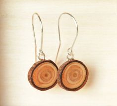 Natural dangle wooden earrings reclaimed wood and by MyPieceOfWood, $18.00 Woodland Plants, Open Board, Got Wood, Wooden Pendant, Wooden Earrings, Wooden Rings, Wood Slices, Wooden Jewelry, Handmade Wooden