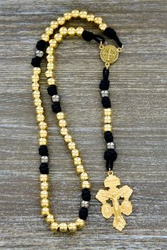 Crafted with uncompromising quality, this rosary features gold-plated Hail Mary beads and gunmetal Our Father beads made from metal alloy, adding a sense of stability to your prayer time. The black paracord 275 rope ensures long-lasting strength for any spiritual battle you may face. 💪⛪️
Protect yourself with the stunning gold St. Benedict center devotional medal, reminding you of God's divine protection and St. Benedict's intercession Spiritual Battle, Paracord Rosary, Divine Protection, Prayer Time, St Benedict, Prayer Times, Our Father, Hail Mary, How To Make Beads