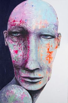 a painting of a man's face with paint splattered all over it