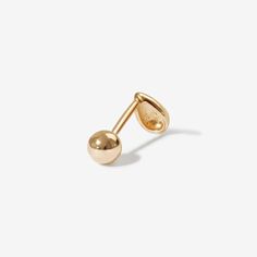 Go with the flow in this perfect stud. Jack's minimal design makes this piercing ideal for every day wear. Pairs well with all your piercings and earrings and is designed to add a sleek, chic edge to your everyday vibe. Created for you in 14 karat solid gold, this single piercing can stay in your ear always, even when you are in the water. Modern 14k Yellow Gold Piercings, Classic 14k Gold Piercings For Everyday, Modern Yellow Gold Piercings For Everyday, Classic Everyday 14k Gold Piercings, Modern Everyday Yellow Gold Piercings, Modern Yellow Gold Everyday Piercings, Modern Internally Threaded Cartilage Earrings For Everyday, Modern Internally Threaded Everyday Cartilage Earrings, Minimalist Internally Threaded Piercings For Everyday