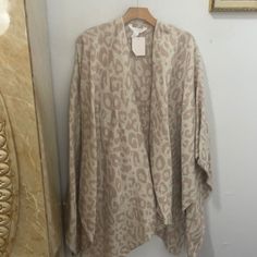 Rose Color Poncho Oversized Long Sleeve Beige Cape, Beige Cozy Long Sleeve Cape, One Size Batwing Sleeve Cape For Spring, Oversized Cape Cardigan For Spring, Chic Oversized Shawl Outerwear, One Size Spring Cape Outerwear, Chic Shawl Outerwear For Spring, Chic Spring Outerwear Shawl, Chic Shawl Outerwear One Size