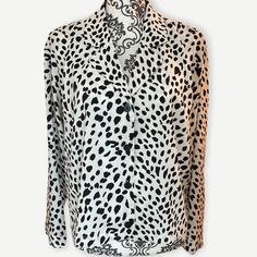 I Love This Shirt!! It’s A Light Feeling Blouse. Black And White Leopard Print With 4 Black Buttons Down The Front, Notched Collar. Size Large. Chic Collared Blouse With Graphic Print, Chic Graphic Print Button-up Blouse, Chic Button-up Blouse With Graphic Print, Elegant Collared Graphic Print Tops, Graphic Print V-neck Blouse For Day Out, Chic Printed V-neck Shirt, White Graphic Print V-neck Blouse, White V-neck Blouse With Graphic Print, Chic Graphic Print Shirt For Day Out