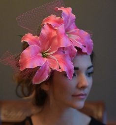 Elegant, romantic enchanting pink lily fascinator hat. The beautiful lily blossoms are nestled in French millinery netting & ready for your special event.  Attaches with a strong & comfortable alligator clip so you have the control to position it exactley where you would like it.  We can also make this in a light shade of pink (as shown in the last picture. Send us a message if you would like the light pink.   Photography Credits: www.leahrachel.com New York Hat, Colors Photography, Dressy Hats, Pink Fascinator, Flower Hair Pieces, Kentucky Derby Party, Tea Party Hats, Fascinator Headband, Floral Hat