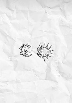 the sun and moon are drawn on white paper