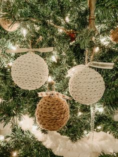 a christmas tree with ornaments hanging from it