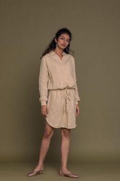 Subtle sophistication and contemporary style come together in this collared shirt dress in sand beige with a drawstring waist and oversized front pocket. Details Made from 100% HempOversized shirtdress Front drawstringPockets on both sidesRhea is 5'8" and is wearing size XS Hemp Dress, Minimalistic Fashion, Tencel Dress, Khaki Shirt, Collared Shirt Dress, The Cliff, Elegant Shoes, Sand Beige, Wrinkle Remover