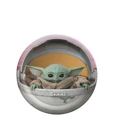 the child yoda doll is in a plastic container