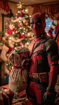 a deadpool christmas tree is in the background