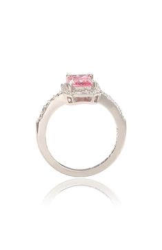 A sterling silver ring is the perfect everyday accessory that goes with many different looks. 0.31"W x 0.39"L setting Sterling silver/sapphire or pink sapphire/cubic zirconia Imported Pink Sterling Silver Halo Ring With Center Stone, Pink Sterling Silver Diamond Ring With Halo Setting, Pink Emerald-cut Ring With Diamond Accents, Pink Emerald Cut Diamond Accented Rings, Emerald Cut Pink Rings With Diamond Accents, Pink Princess Cut Ring With Diamond Accents, Silver Pink Sapphire Diamond Ring With Halo Setting, Silver Diamond Ring With Halo Setting And Pink Sapphire, Classic Silver Ring With Pink Sapphire